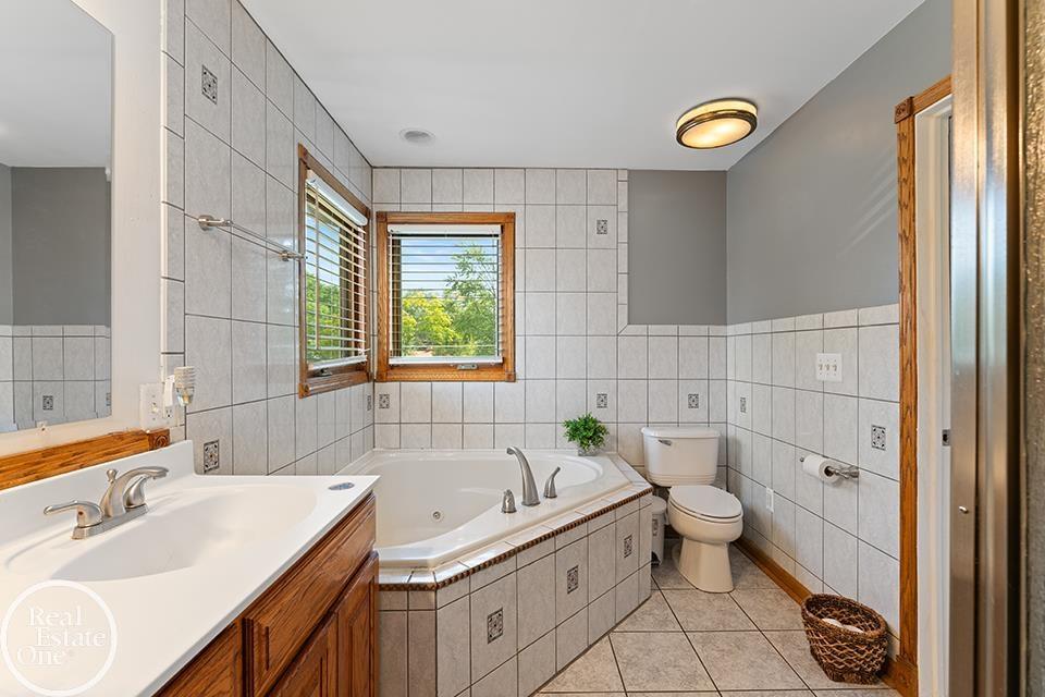Saint Clair Shores Master Bath Suite. Photo by: Focus Nest Media
