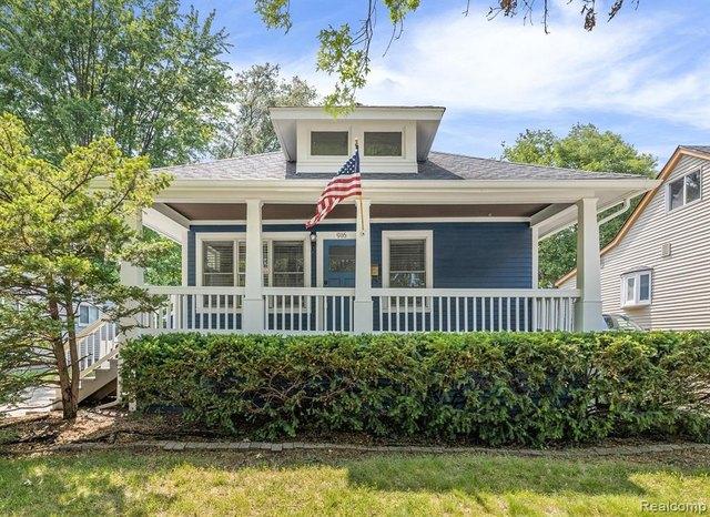 Royal Oak bungalow with a covered front porch, landscaped yard, and residential streetscape.